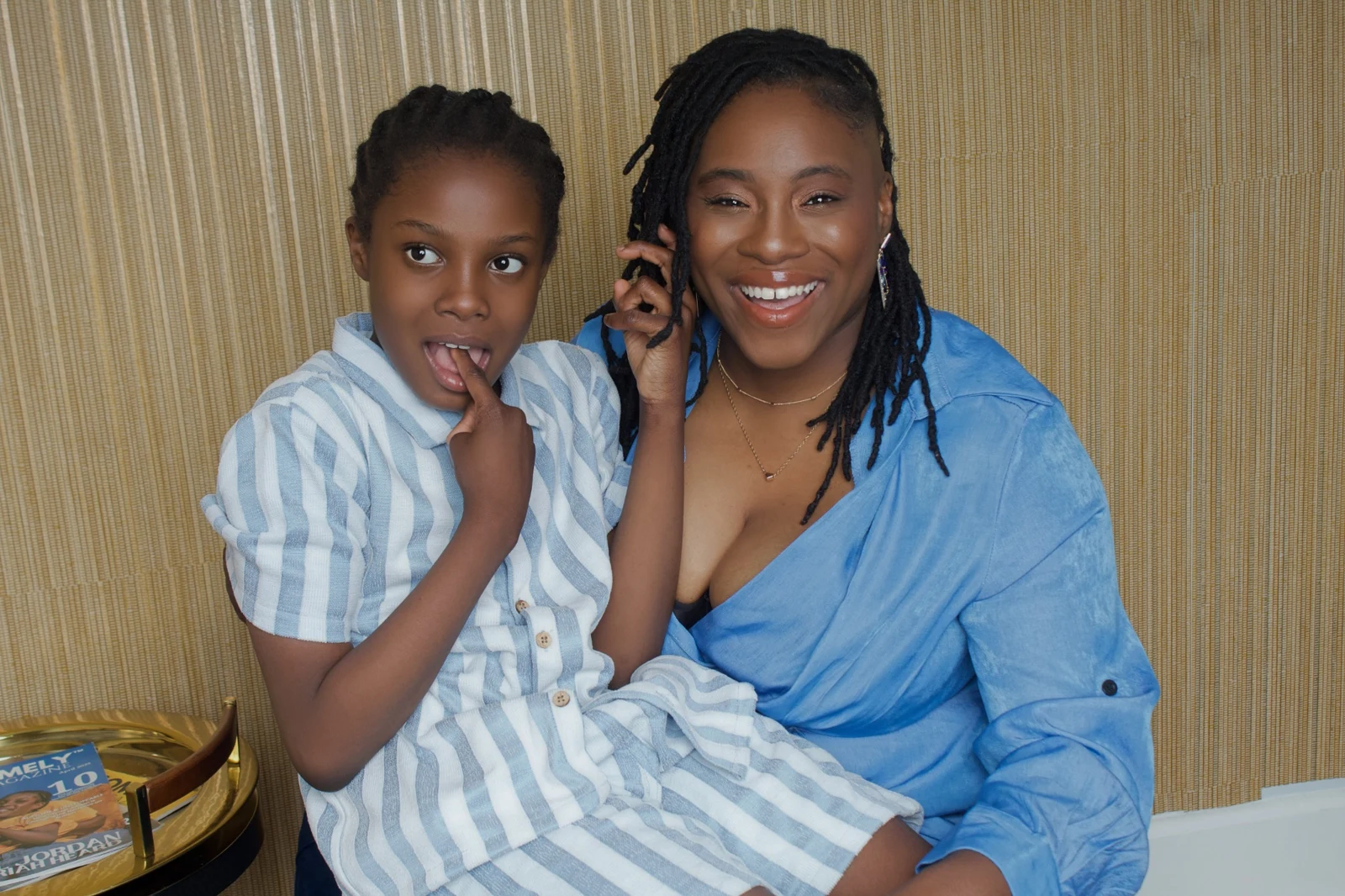 Dr. Crystal Jordan, L.H.D., seated with Zachariah
